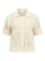 Produktbillede af creme farvet BINDI cardigan. Set forfra. Fra BySofieSønderby