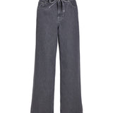 Grå jeans med vide ben og snøre i taljen, mærket "JJXX" synligt indvendigt, placeret mod en hvid baggrund.