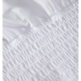 Detaljebillede af hvid EVELYN smock top. Fra BySofieSønderby