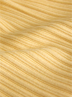 Detaljebillede af gul HADLEY polo. Fra BySofieSønderby