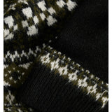 Detaljebillede af sort KRISTIN striktrøje. Fra BySofieSønderby.