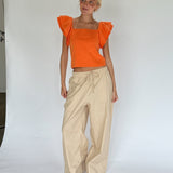 Modelbillede af LEONORA top, orange. Fra BySofieSønderby
