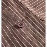 Detaljebillede af brun/lyserød MADDY jakke. Fra BySofieSønderby.