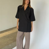 MINNIE oversized kortärmad blazer, svart