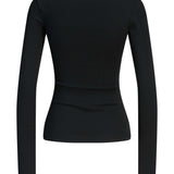 Produktbillede af sort STAR bluse. Set bagfra. Fra BySofieSønderby